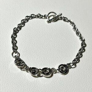 handmade indie whimsigoth spiral swirl connector stainless steel chain